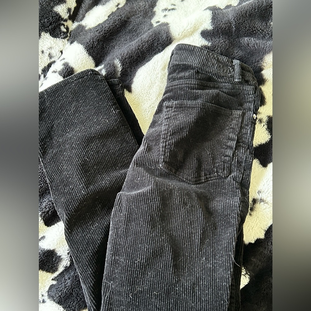 Black suede high wasted jeans.